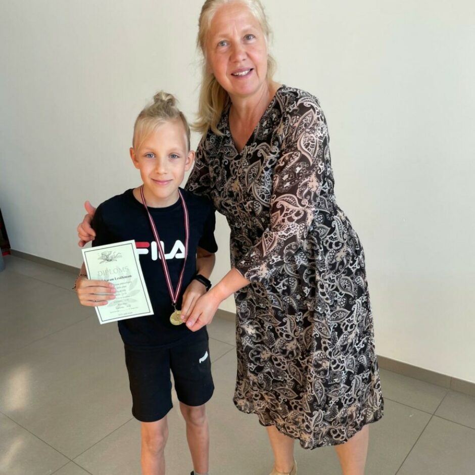 peldētāju apbalvošana