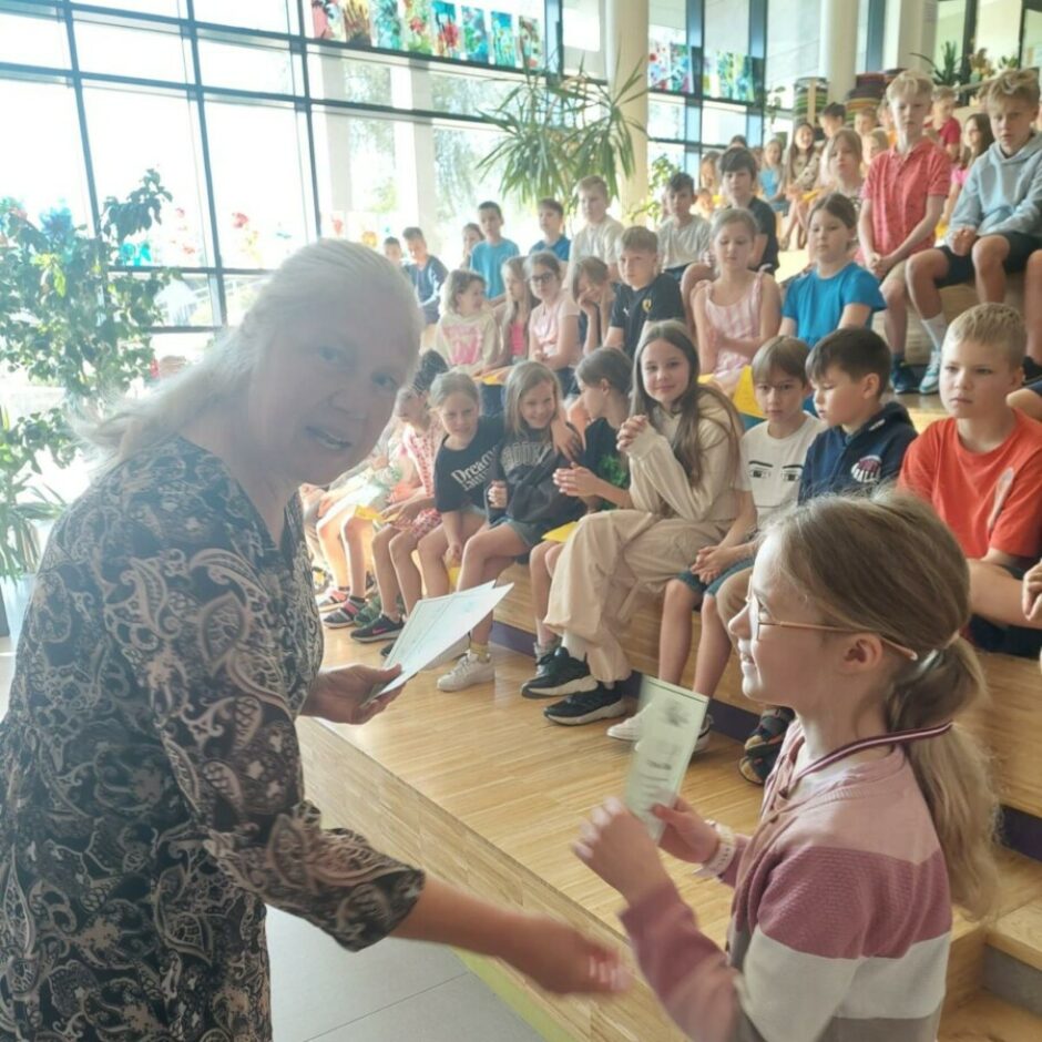 peldētāju apbalvošana