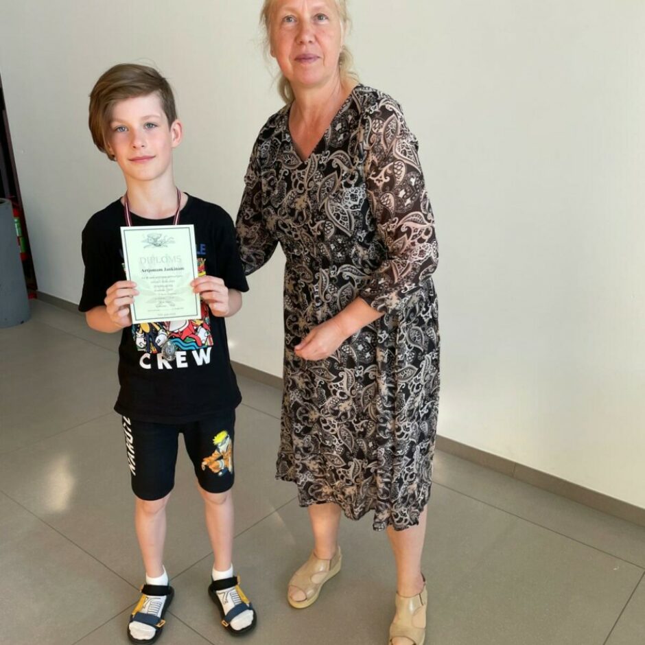 peldētāju apbalvošana